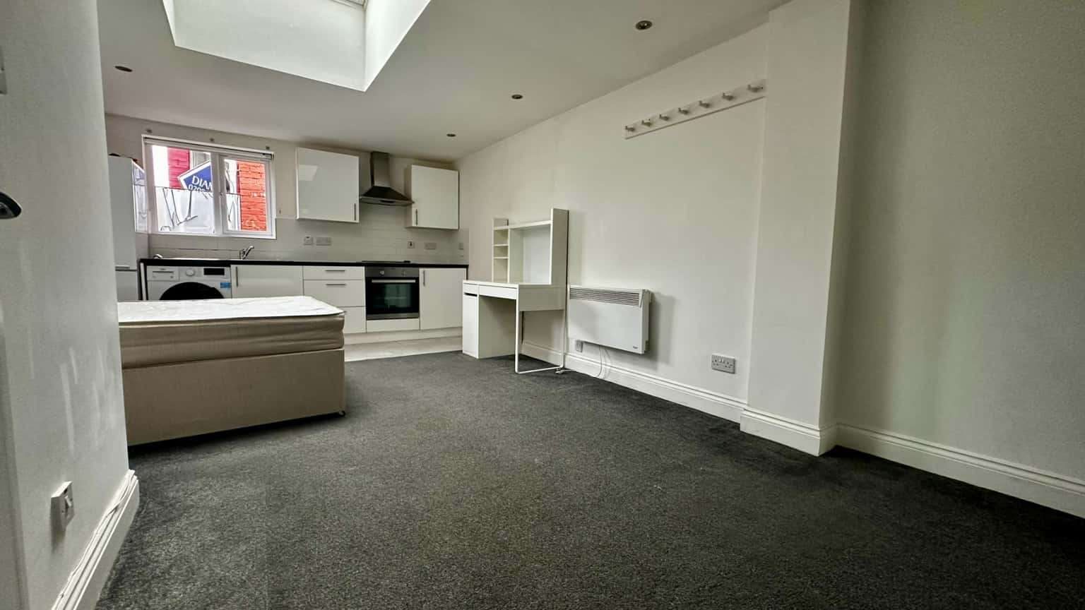 Well Presented Ground Floor Studio Flat in Dollis Hill: Spacious Kitchen, Near Amenities & Transport property first image